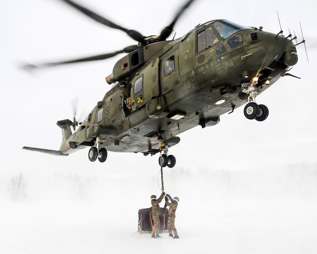 helicopter in flight making manoeuvre